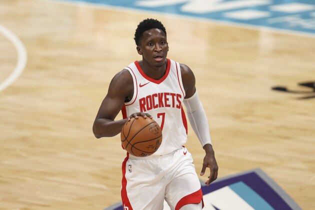 Houston Rockets guard Victor Oladipo (7) brings the ball up court against the Charlotte Hornets in the first half of an NBA basketball game in Charlotte, N.C., Monday, Feb. 8, 2021. (AP Photo/Nell Redmond)