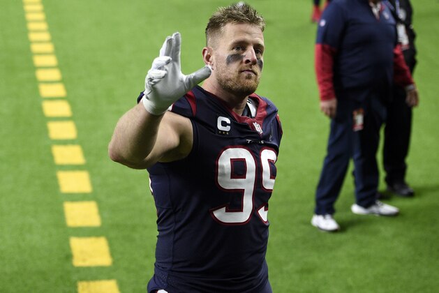 FILE - In this Jan. 3, 2021, file photo, Houston Texans defensive end J.J. Watt (99) waves to fans as he walks off the field after an NFL football game against the Tennessee Titans in Houston. Watt is gone from the Texans and Deshaun Watson wants out, too. The Texans have been making plenty of headlines this offseason. Not one has been good. (AP Photo/Eric Christian Smith, File)