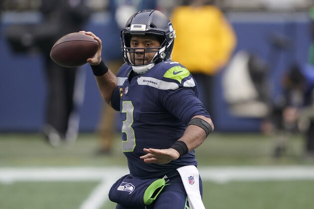 Seattle Seahawks quarterback Russell Wilson (3) in action against the Los Angeles Rams during an NFL wild-card playoff football game, Saturday, Jan. 9, 2021, in Seattle. (AP Photo/Ted S. Warren)