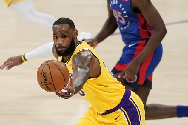 Los Angeles Lakers forward LeBron James dribbles against the Detroit Pistons during an NBA basketball game Saturday, Feb. 6, 2021, in Los Angeles. (AP Photo/Marcio Jose Sanchez)
