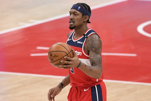 Washington Wizards guard Bradley Beal (3) dribbles the ball during the first half of an NBA basketball game against the Toronto Raptors, Wednesday, Feb. 10, 2021, in Washington. (AP Photo/Nick Wass)