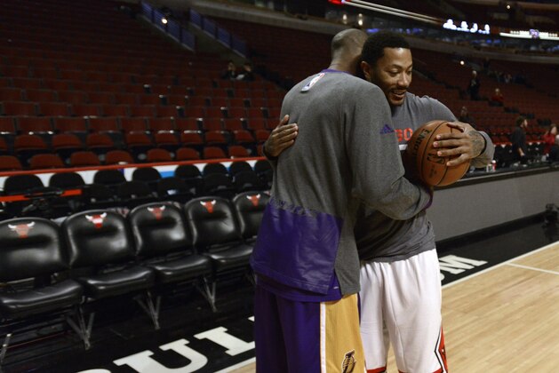 Los Angeles Lakers' Kobe Bryant, left, hugs Chicago Bulls' Derrick Rose, right, before an NBA basketball game between the Lakers and the Bulls, Sunday, Feb. 21, 2016, in Chicago. (AP Photo/Paul Beaty) Los Angeles Lakers' Kobe Bryant, left, hugs Chicago Bulls' Derrick Rose, right, before an NBA basketball game between the Lakers and the Bulls, Sunday, Feb. 21, 2016, in Chicago. (AP Photo/Paul Beaty)