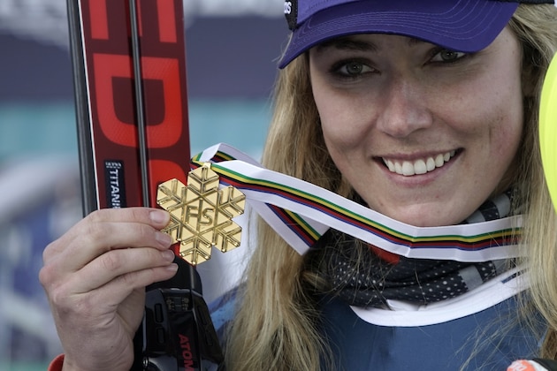 United States' Mikaela Shiffrin shows her gold medal for the women's combined race, at the alpine ski World Championships, in Cortina d'Ampezzo, Italy, Monday, Feb. 15, 2021. (AP Photo/Giovanni Auletta) United States' Mikaela Shiffrin shows her gold medal for the women's combined race, at the alpine ski World Championships, in Cortina d'Ampezzo, Italy, Monday, Feb. 15, 2021. (AP Photo/Giovanni Auletta)