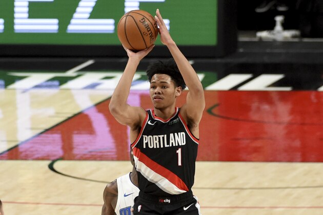Portland Trail Blazers guard Anfernee Simons hits a three point shot during the second half of an NBA basketball game against the Orlando Magic in Portland, Ore., Tuesday, Feb. 9, 2021. The Blazers won 106-97. (AP Photo/Steve Dykes)