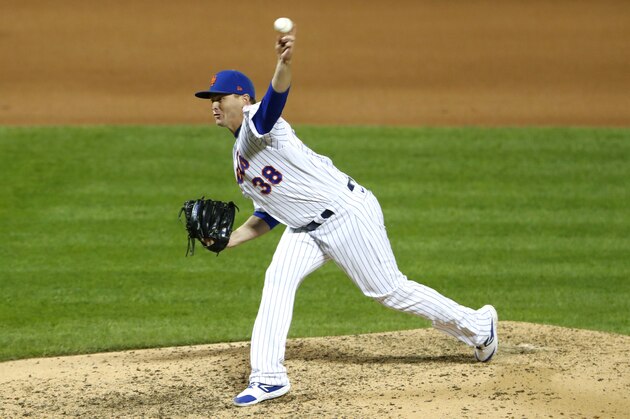 New York Mets relief pitcher Justin Wilson (38) throws against the Atlanta Braves during the seventh inning of a baseball game, Saturday, Sept. 19, 2020, in New York. (AP Photo/Noah K. Murray)