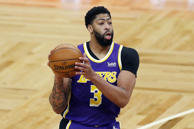 Los Angeles Lakers' Anthony Davis plays against the Boston Celtics during the first half of an NBA basketball game, Saturday, Jan. 30, 2021, in Boston. (AP Photo/Michael Dwyer)