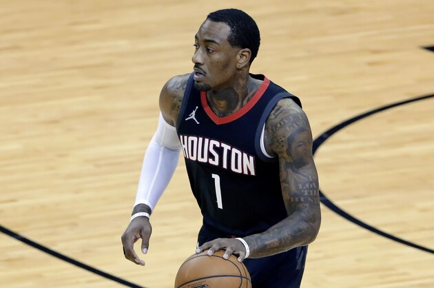 Houston Rockets guard John Wall (1) during the first half of an NBA basketball game Saturday, Feb. 6, 2021, in Houston. (AP Photo/Michael Wyke)