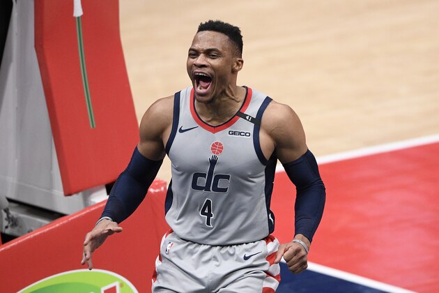 Washington Wizards guard Russell Westbrook (4) reacts after he scored and was fouled during the second half of an NBA basketball game against the Boston Celtics, Sunday, Feb. 14, 2021, in Washington. (AP Photo/Nick Wass)