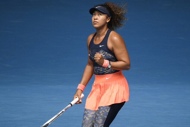 Japan's Naomi Osaka reacts after winning a point against Taiwan's Hsieh Su-wei during their quarterfinal match at the Australian Open tennis championship in Melbourne, Australia, Tuesday, Feb. 16, 2021.(AP Photo/Hamish Blair)