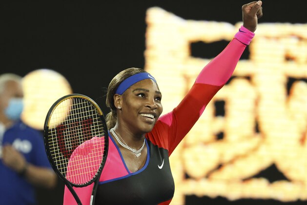 United States' Serena Williams celebrates after defeating Romania's Simona Halep during their quarterfinal match at the Australian Open tennis championship in Melbourne, Australia, Tuesday, Feb. 16, 2021.(AP Photo/Hamish Blair)