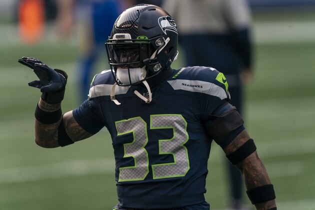 Seattle Seahawks defensive back Jamal Adams gestures during warmups before an NFL wild-card playoff football game against the Los Angeles Rams, Saturday, Jan. 9, 2021, in Seattle. The Rams won 30-20. (AP Photo/Stephen Brashear)