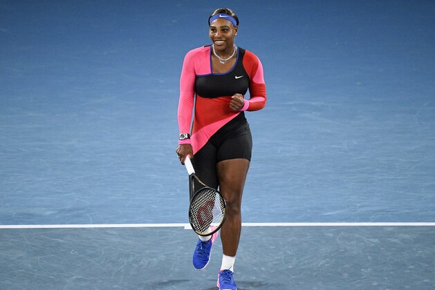 United States' Serena Williams celebrates after defeating Romania's Simona Halep in their quarterfinal match at the Australian Open tennis championship in Melbourne, Australia, Tuesday, Feb. 16, 2021.(AP Photo/Andy Brownbill)