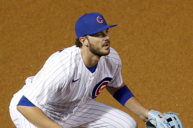 Chicago Cubs third baseman Kris Bryant fields his position during a baseball game Tuesday, Aug. 4, 2020, in Chicago. (AP Photo/Charles Rex Arbogast)