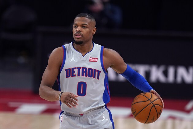 Detroit Pistons guard Dennis Smith Jr. brings the ball up court during the second half of an NBA basketball game against the Indiana Pacers, Thursday, Feb. 11, 2021, in Detroit. (AP Photo/Carlos Osorio)