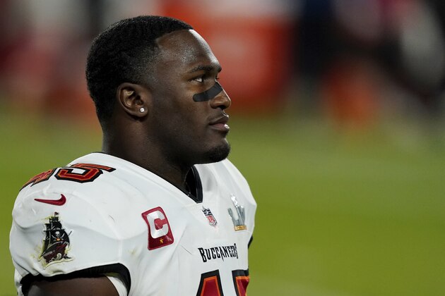 Tampa Bay Buccaneers inside linebacker Devin White (45) walks toward the sideline during the second half of the NFL Super Bowl 55 football game against the Kansas City Chiefs, Sunday, Feb. 7, 2021, in Tampa, Fla. The Tampa Bay Buccaneers defeated the Kansas City Chiefs 31-9. (AP Photo/Steve Luciano)