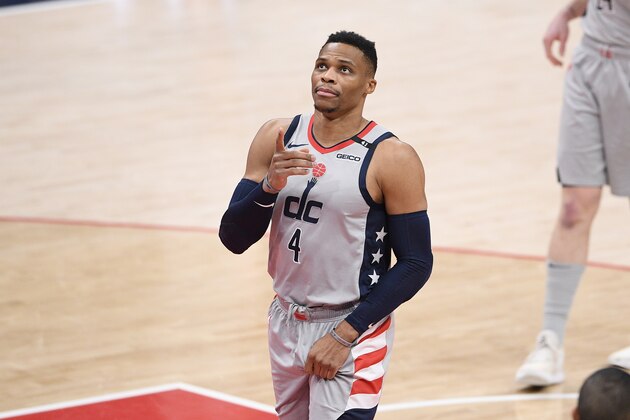 Washington Wizards guard Russell Westbrook (4) gestures before an NBA basketball game against the Boston Celtics, Sunday, Feb. 14, 2021, in Washington. (AP Photo/Nick Wass)