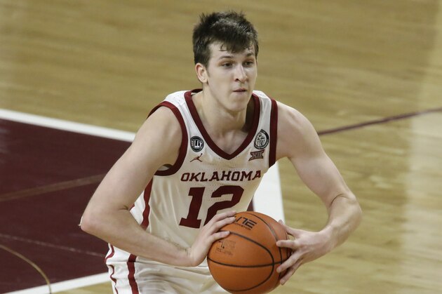 Oklahoma's Austin Reaves (12)during the second half of an NCAA college basketball game against Iowa State in Norman, Okla., Saturday, Feb. 6, 2021. (AP Photo/Garett Fisbeck)