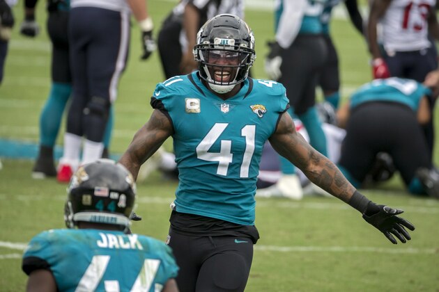 Jacksonville Jaguars defensive end Josh Allen (41) celebrates a turnover against the Houston Texans during the first half of an NFL football game, Sunday, Nov. 8, 2020, in Jacksonville, Fla. (AP Photo/Stephen B. Morton)