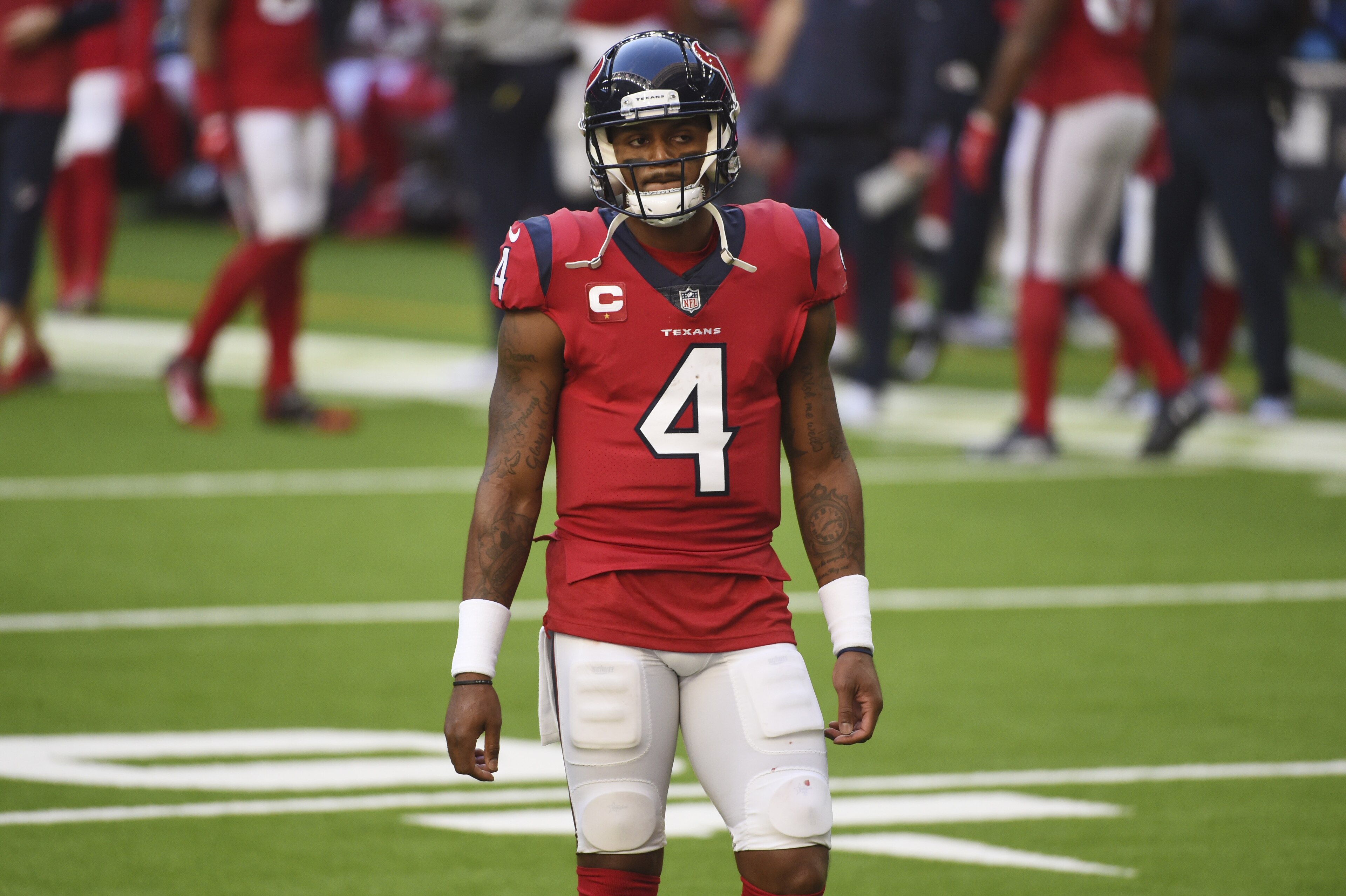 Houston Texans quarterback Deshaun Watson (4) walks off the field after he was sacked during the second half of an NFL football game against the Indianapolis Colts, Sunday, Dec. 6, 2020, in Houston. (AP Photo/Eric Christian Smith)