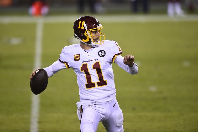 Washington Football Team's Alex Smith plays during the second half of an NFL football game against the Philadelphia Eagles, Sunday, Jan. 3, 2021, in Philadelphia. (AP Photo/Derik Hamilton)