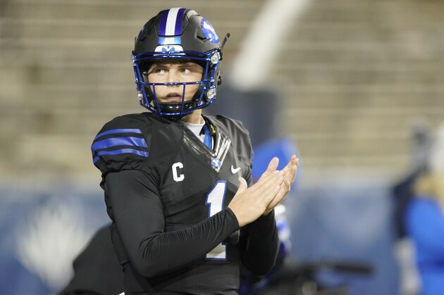 BYU quarterback Zach Wilson (1) looks to the sidelines in the first half, of an NCAA college football game against San Diego State Saturday, Dec. 12, 2020, in Provo, Utah. (AP Photo/George Frey)