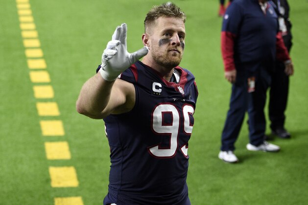 FILE - In this Jan. 3, 2021, file photo, Houston Texans defensive end J.J. Watt (99) waves to fans as he walks off the field after an NFL football game against the Tennessee Titans in Houston. Watt is gone from the Texans and Deshaun Watson wants out, too. The Texans have been making plenty of headlines this offseason. Not one has been good. (AP Photo/Eric Christian Smith, File)