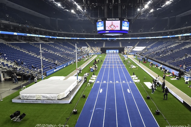 Tribunes in the Mercedes Benz Arena are empty due to the coronavirus rules during the ISTAF indoor athletics meeting in Berlin, Germany, Friday, Feb. 5, 2021. (Tobias Schwarz/Pool via AP)