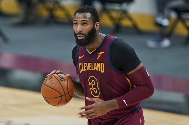 Cleveland Cavaliers' Andre Drummond drives the second half of an NBA basketball game against the Milwaukee Bucks, Friday, Feb. 5, 2021, in Cleveland. (AP Photo/Tony Dejak)
