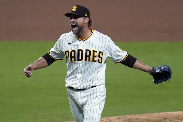 San Diego Padres relief pitcher Trevor Rosenthal celebrates after the Padres defeated the St. Louis Cardinals 4-0 in Game 3 of a National League wild-card baseball series Friday, Oct. 2, 2020, in San Diego. The Padres advanced to the NL Division Series. (AP Photo/Gregory Bull)