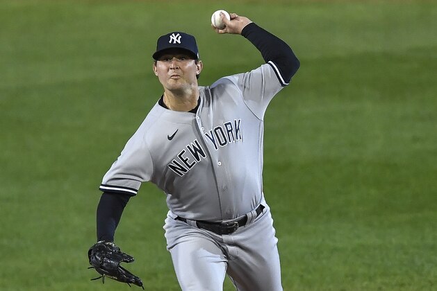 New York Yankees pitcher Zack Britton throws to a Toronto Blue Jays batter during the eighth inning of a baseball game in Buffalo, N.Y., Tuesday, Sept. 22, 2020. (AP Photo/Adrian Kraus)