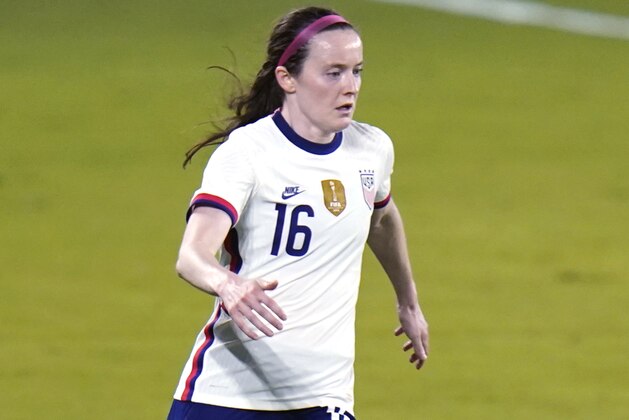 United States midfielder Rose Lavelle (16) moves the ball against Colombia during the second half of an international friendly soccer match, Friday, Jan. 22, 2021, in Orlando, Fla. (AP Photo/John Raoux)