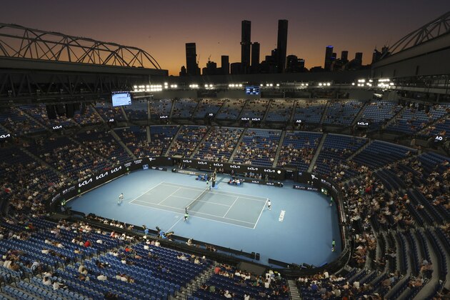 Serbia's Novak Djokovic and Russia's Aslan Karatsev play their semifinal match on Rod Laver Arena at the Australian Open tennis championship in Melbourne, Australia, Thursday, Feb. 18, 2021.(AP Photo/Hamish Blair)