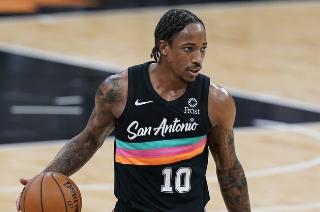 San Antonio Spurs forward DeMar DeRozan (10) during the first half of an NBA basketball game against the Golden State Warriors in San Antonio, Tuesday, Feb. 9, 2021. (AP Photo/Eric Gay)