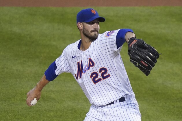 New York Mets starting pitcher Rick Porcello winds up during the first inning of the team's baseball game against the Philadelphia Phillies, Friday, Sept. 4, 2020, in New York. (AP Photo/John Minchillo)