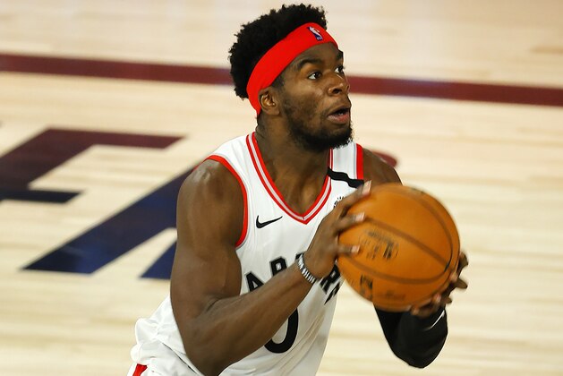 Toronto Raptors' Terence Davis (0) handles the ball during the third quarter against the Denver Nuggets in  an NBA basketball game Friday, Aug. 14, 2020, in Lake Buena Vista, Fla. (Mike Ehrmann/Pool Photo via AP)