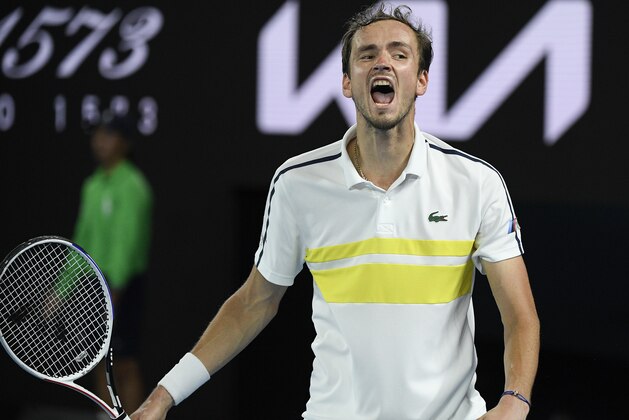 Russia's Daniil Medvedev reacts after winning a point against Greece's Stefanos Tsitsipas during their semifinal match at the Australian Open tennis championship in Melbourne, Australia, Friday, Feb. 19, 2021.(AP Photo/Andy Brownbill)