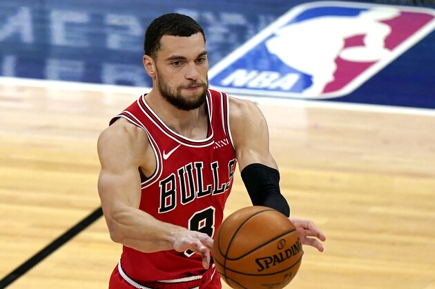 Chicago Bulls guard Zach LaVine passes against the Portland Trail Blazers during the first half of an NBA basketball game in Chicago, Saturday, Jan. 30, 2021. (AP Photo/Nam Y. Huh)