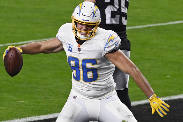 Los Angeles Chargers tight end Hunter Henry (86) celebrates after scoring a touchdown against the Las Vegas Raiders during the first half of an NFL football game, Thursday, Dec. 17, 2020, in Las Vegas. (AP Photo/David Becker)