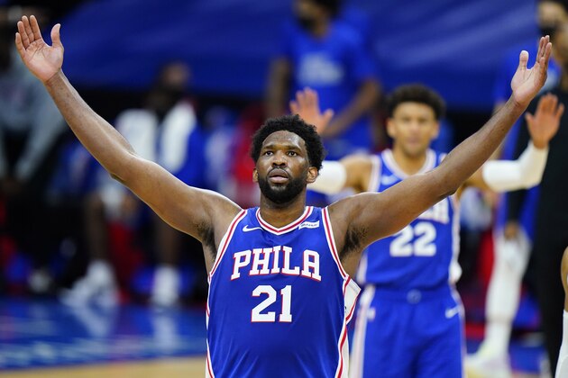 Philadelphia 76ers' Joel Embiid reacts after a basket during the second half of an NBA basketball game against the Chicago Bulls, Friday, Feb. 19, 2021, in Philadelphia. (AP Photo/Matt Slocum)