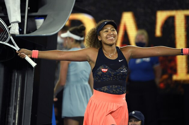 Japan's Naomi Osaka celebrates after defeating United States' Jennifer Brady in the women's singles final at the Australian Open tennis championship in Melbourne, Australia, Saturday, Feb. 20, 2021(AP Photo/Andy Brownbill)