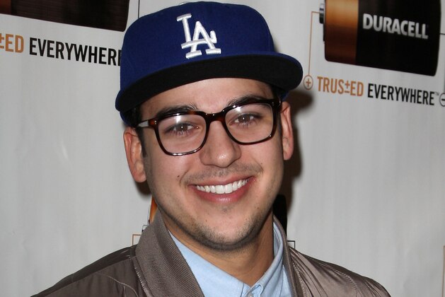 TV personality Rob Kardashian poses at the Chris Daughtry Hosts a Live Facebook Concert to Celebrate Duracell's Holiday Insurance Program event at Rockwood Music Hall, Wednesday, Dec. 14, 2011 in New York. The program provides parents with tools to create an unforgettable Christmas morning for their kids and children in need with giveaways and reviews of the latest toys. (AP Photo/Starpix, Kristina Bumphrey)