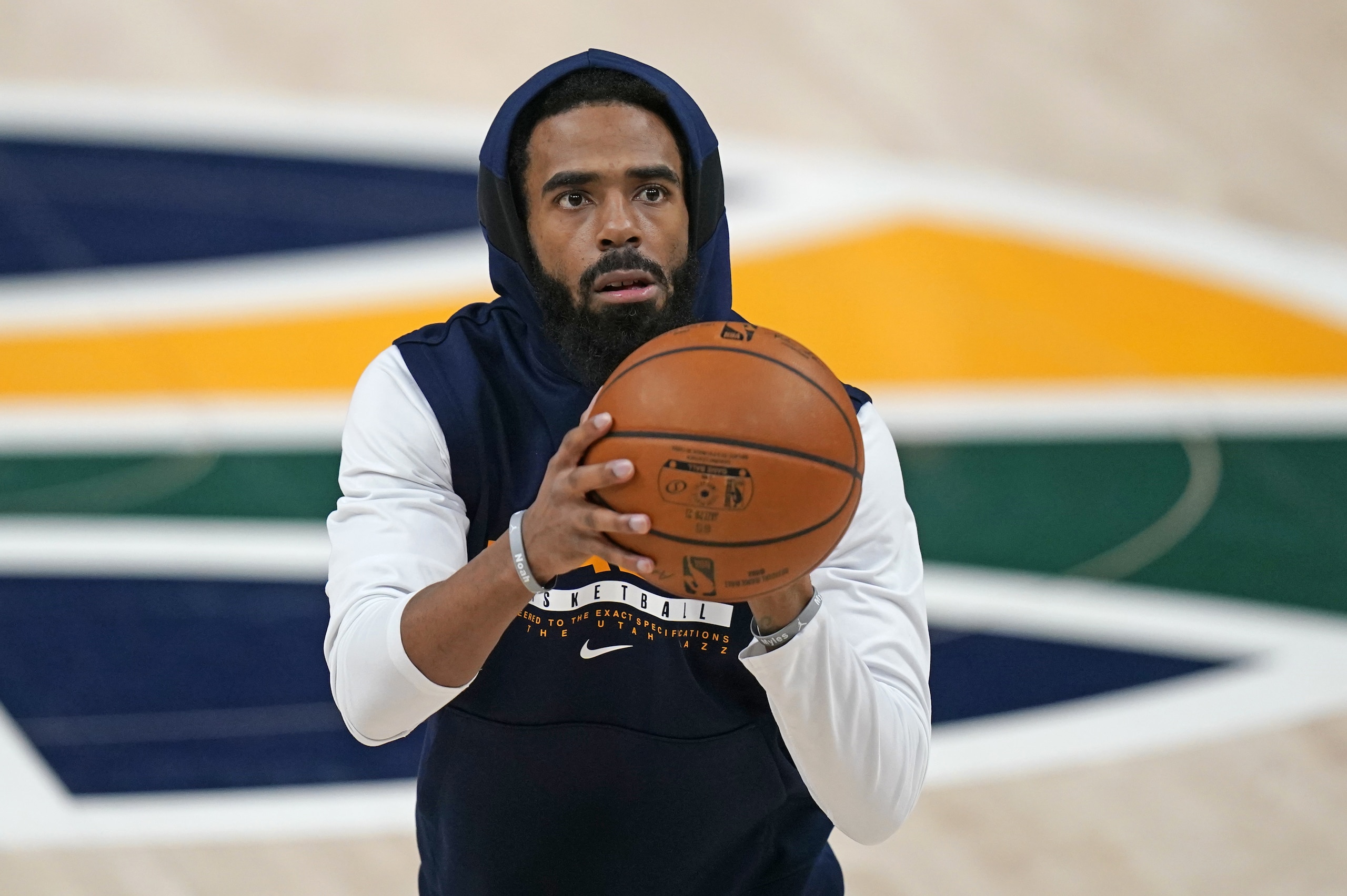 Utah Jazz guard Mike Conley warms up before their NBA basketball game against the Milwaukee Bucks Friday, Feb. 12, 2021, in Salt Lake City. (AP Photo/Rick Bowmer)