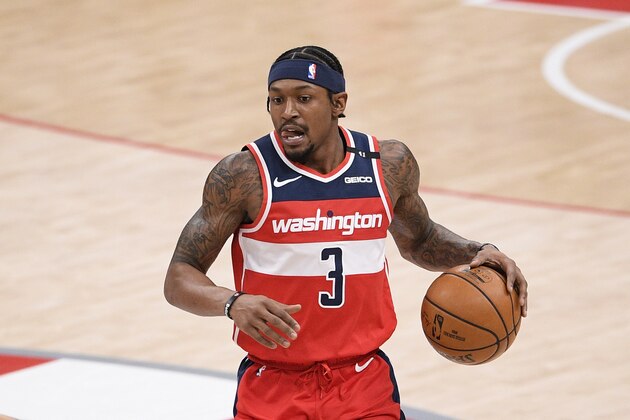Washington Wizards guard Bradley Beal (3) dribbles the ball during the first half of an NBA basketball game against the Toronto Raptors, Wednesday, Feb. 10, 2021, in Washington. (AP Photo/Nick Wass)