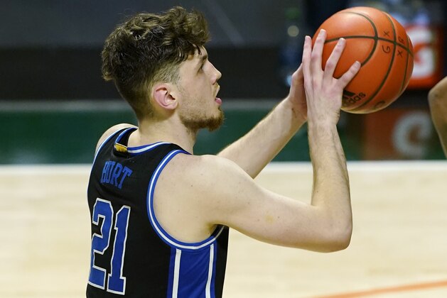 Duke forward Matthew Hurt (21) aims a shot from the free throw line during the second half of an NCAA college basketball game against Miami, Monday, Feb. 1, 2021, in Coral Gables, Fla. (AP Photo/Marta Lavandier)
