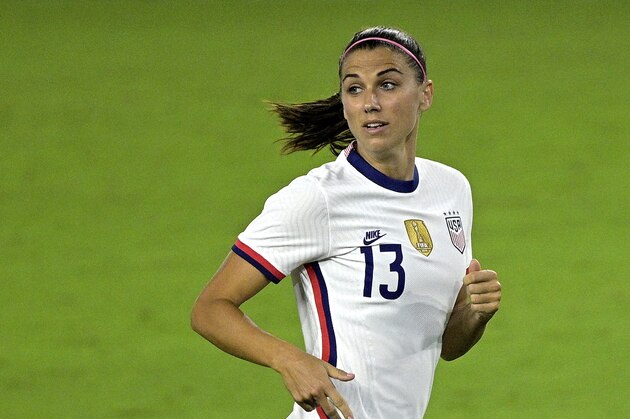 United States forward Alex Morgan (13) follows a play during the second half of a SheBelieves Cup women's soccer match against Canada, Thursday, Feb. 18, 2021, in Orlando, Fla. (AP Photo/Phelan M. Ebenhack)