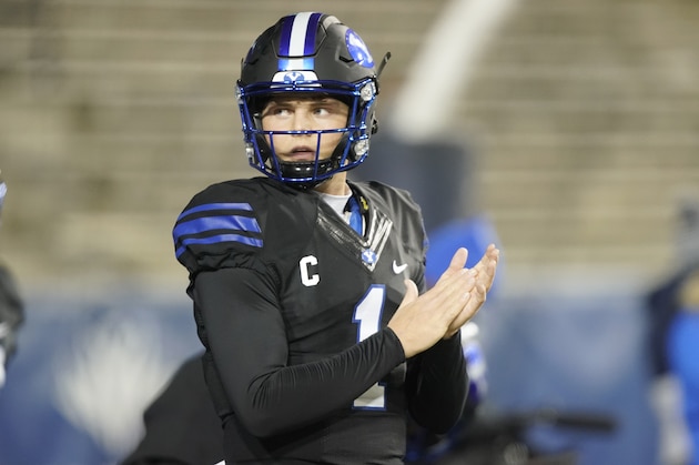 BYU quarterback Zach Wilson (1) looks to the sidelines in the first half, of an NCAA college football game against San Diego State Saturday, Dec. 12, 2020, in Provo, Utah. (AP Photo/George Frey)