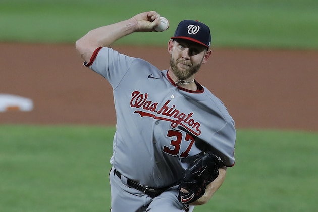 Washington Nationals starting pitcher Stephen Strasburg throws a pitch to the Baltimore Orioles during the first inning of a baseball game, Friday, Aug. 14, 2020, in Baltimore. (AP Photo/Julio Cortez) Washington Nationals starting pitcher Stephen Strasburg throws a pitch to the Baltimore Orioles during the first inning of a baseball game, Friday, Aug. 14, 2020, in Baltimore. (AP Photo/Julio Cortez)