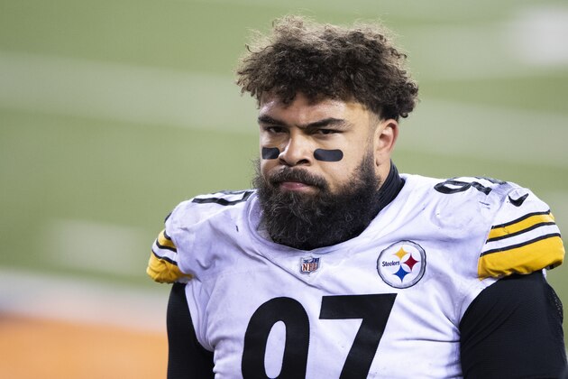 Pittsburgh Steelers defensive end Cameron Heyward (97) walks off the field after a 27-17 loss to the Cincinnati Bengals during an NFL football game, Sunday, Dec. 21, 2020, in Cincinnati. (AP Photo/Emilee Chinn)