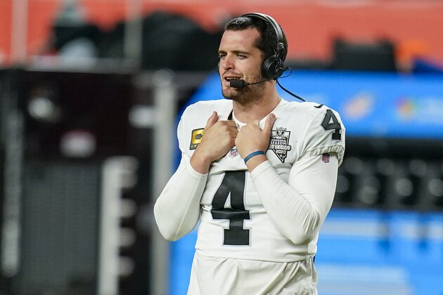 Las Vegas Raiders quarterback Nathan Peterman (3) talks during a television interview following the team's win against the Denver Broncos during an NFL football game, Sunday, Jan. 3, 2021, in Denver. (AP Photo/Jack Dempsey)