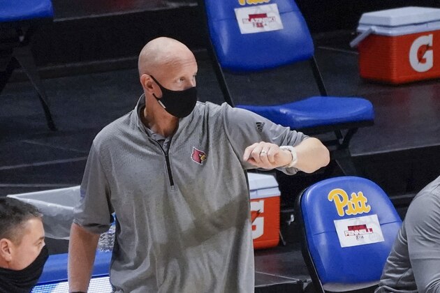 Louisville head coach Chris Mack works curtsied as his team plays against Pittsburgh during an NCAA college basketball game, Tuesday, Dec. 22, 2020, in Pittsburgh. (AP Photo/Keith Srakocic) Louisville head coach Chris Mack works curtsied as his team plays against Pittsburgh during an NCAA college basketball game, Tuesday, Dec. 22, 2020, in Pittsburgh. (AP Photo/Keith Srakocic)
